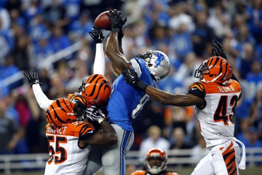 Calvin Johnson makes a spectacular grab in triple coverage against the Bengals' secondary (Oct. 20, 2013)